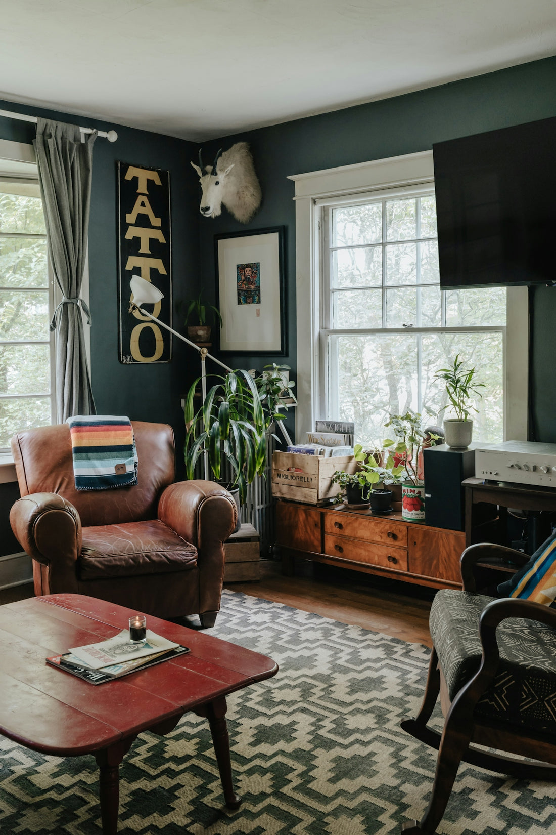 A living room filled with furniture and a flat screen TV